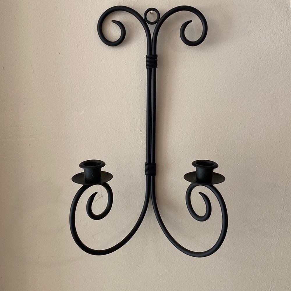 Black metal hanging candle holder.